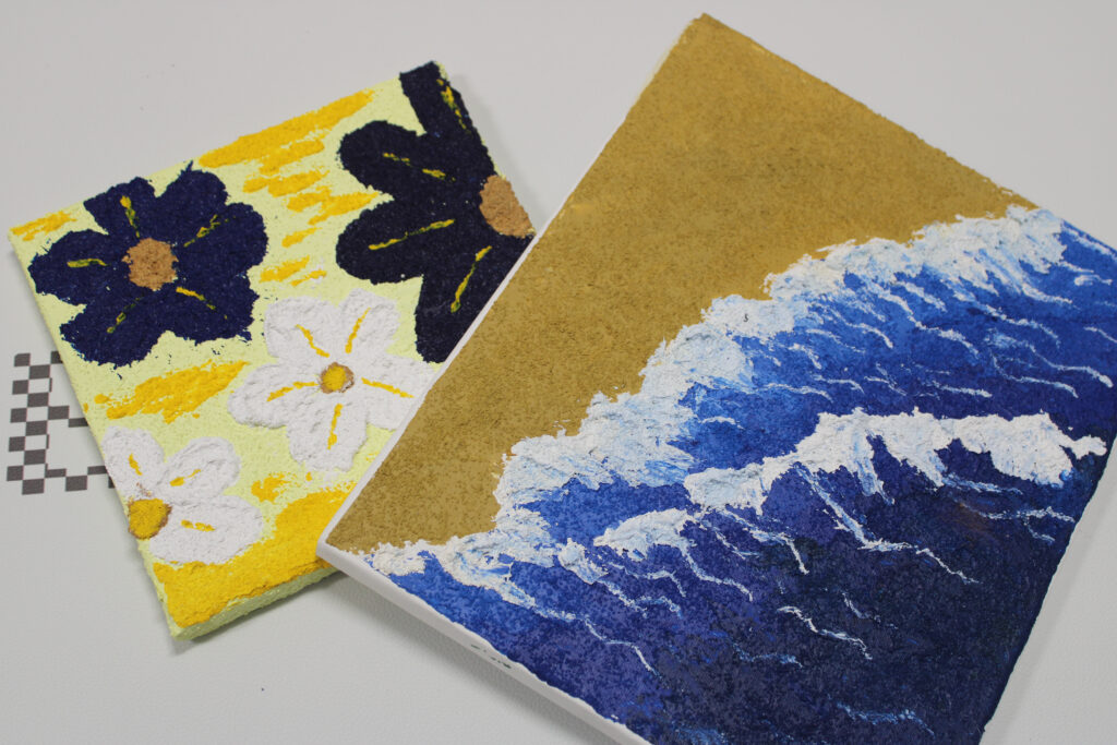 Close-up of a vibrant texture painting project at Crafts Zone, featuring bold colors and unique patterns.