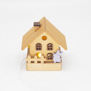 A handcrafted wooden house night light with intricate details, softly glowing to create a warm and cozy ambiance.