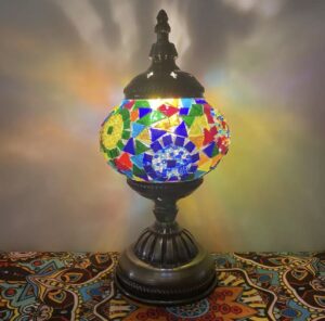 A vibrant Turkish Lamp created at Crafts Zone, showcasing intricate mosaic patterns and colorful glass details.