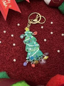 A vibrant Shrinky Dink craft project featuring colorful designs and creative keychains made at Crafts Zone.