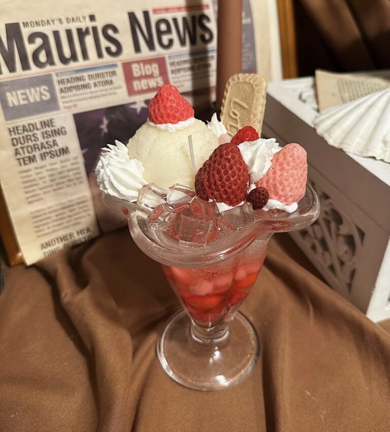 Dessert-inspired Martini Candle DIY with realistic ice cream, strawberries, and biscuit decorations.
