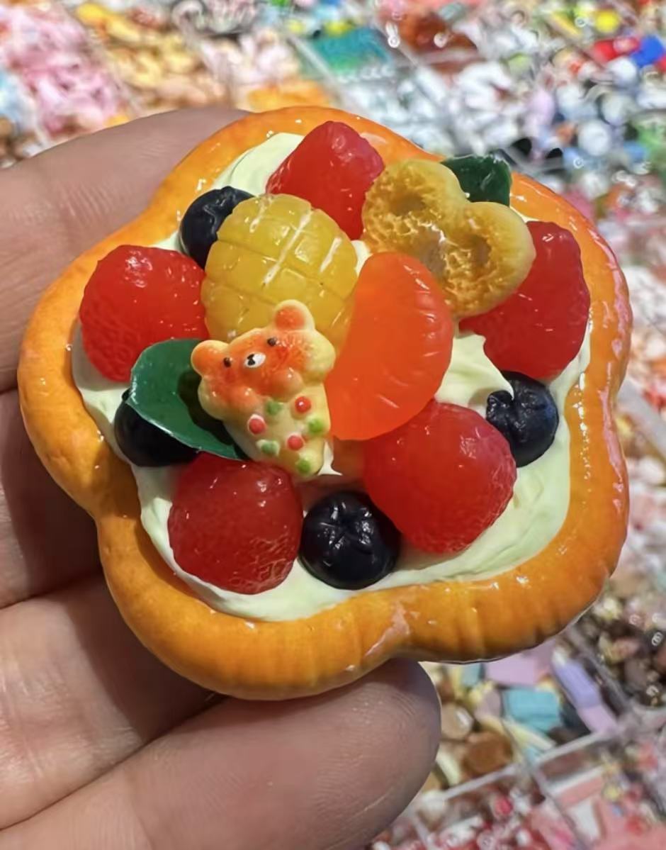Miniature fruit tart with assorted colorful toppings