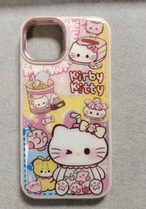 Cute phone case with Kirby and Hello Kitty mashup design, featuring pastel colors and playful food elements.