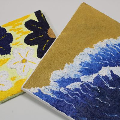 Close-up of a vibrant texture painting project at Crafts Zone, featuring bold colors and unique patterns.